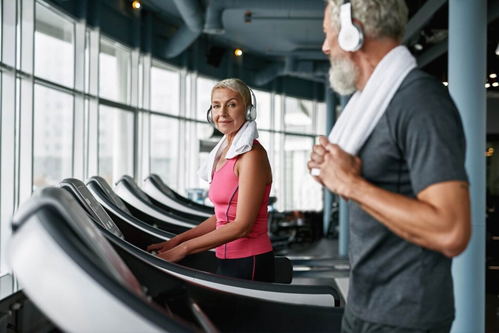 Couple enjoying exercising in the gym together